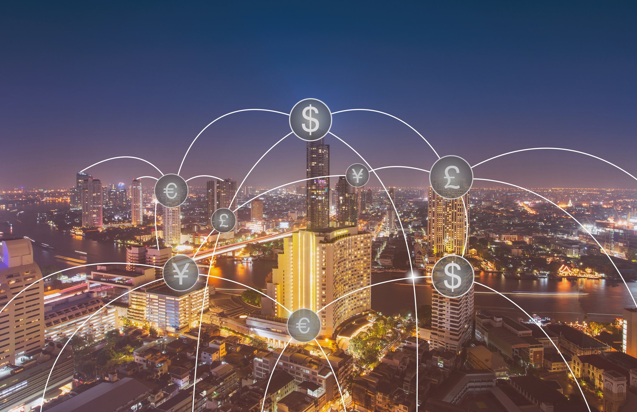 Aerial view of money transfer icon over cityscape for banking concept background.